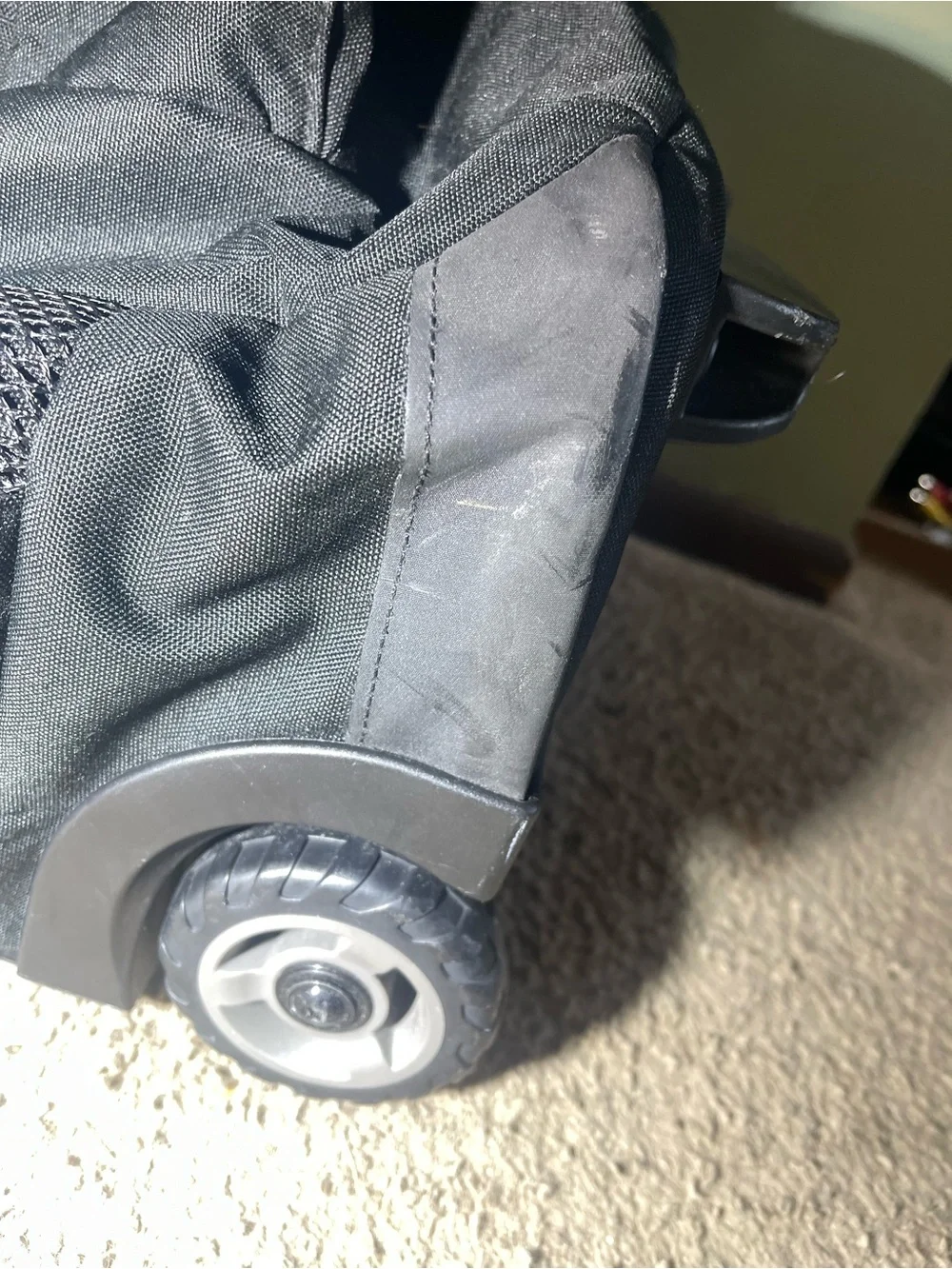 Jansport Black Rolling Backpack with Telescopic Handle